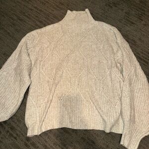 cream sweater